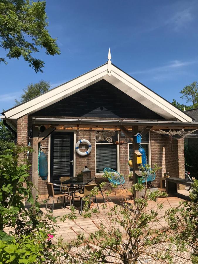 Bellemare Bungalow Lauwersmeer Mit Ueberdachte Veranda Und Eingezaeuntem Garten Anjum Exterior photo